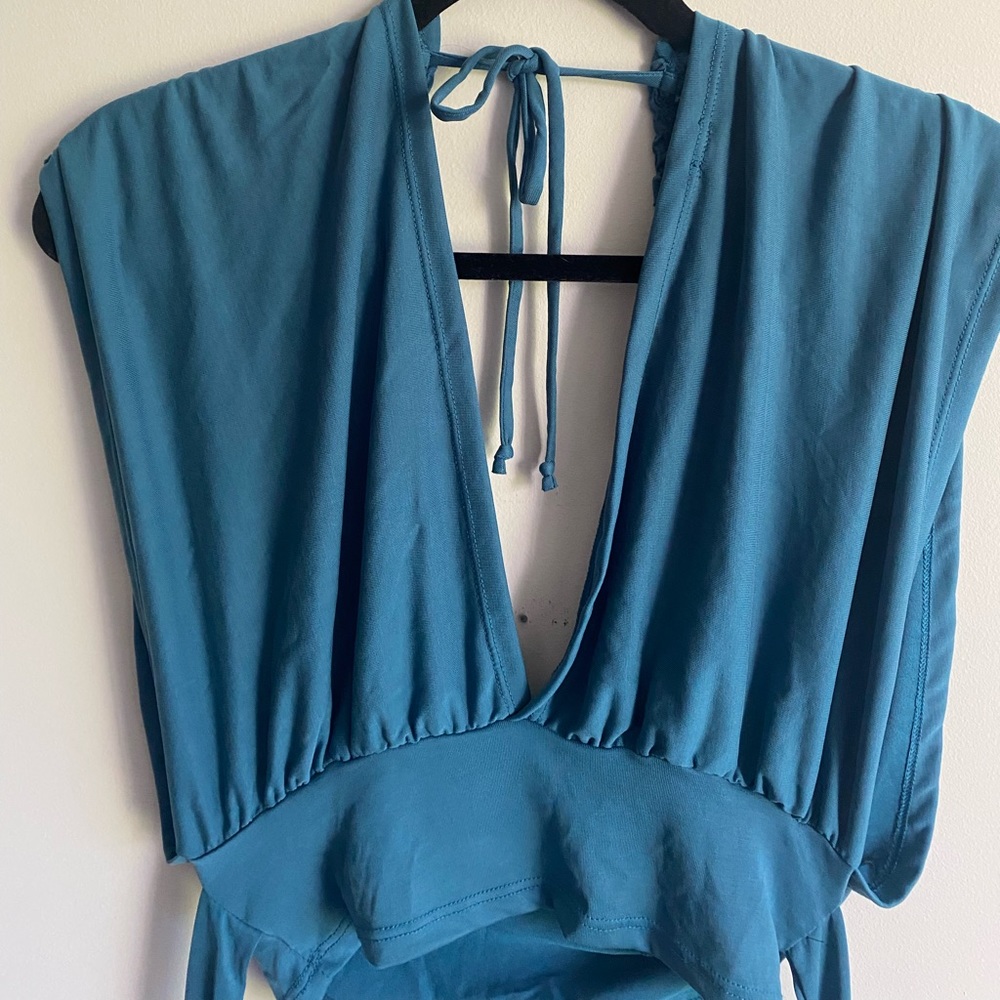 Sexy turquoise sleeveless deep V front and back Free People top NWT